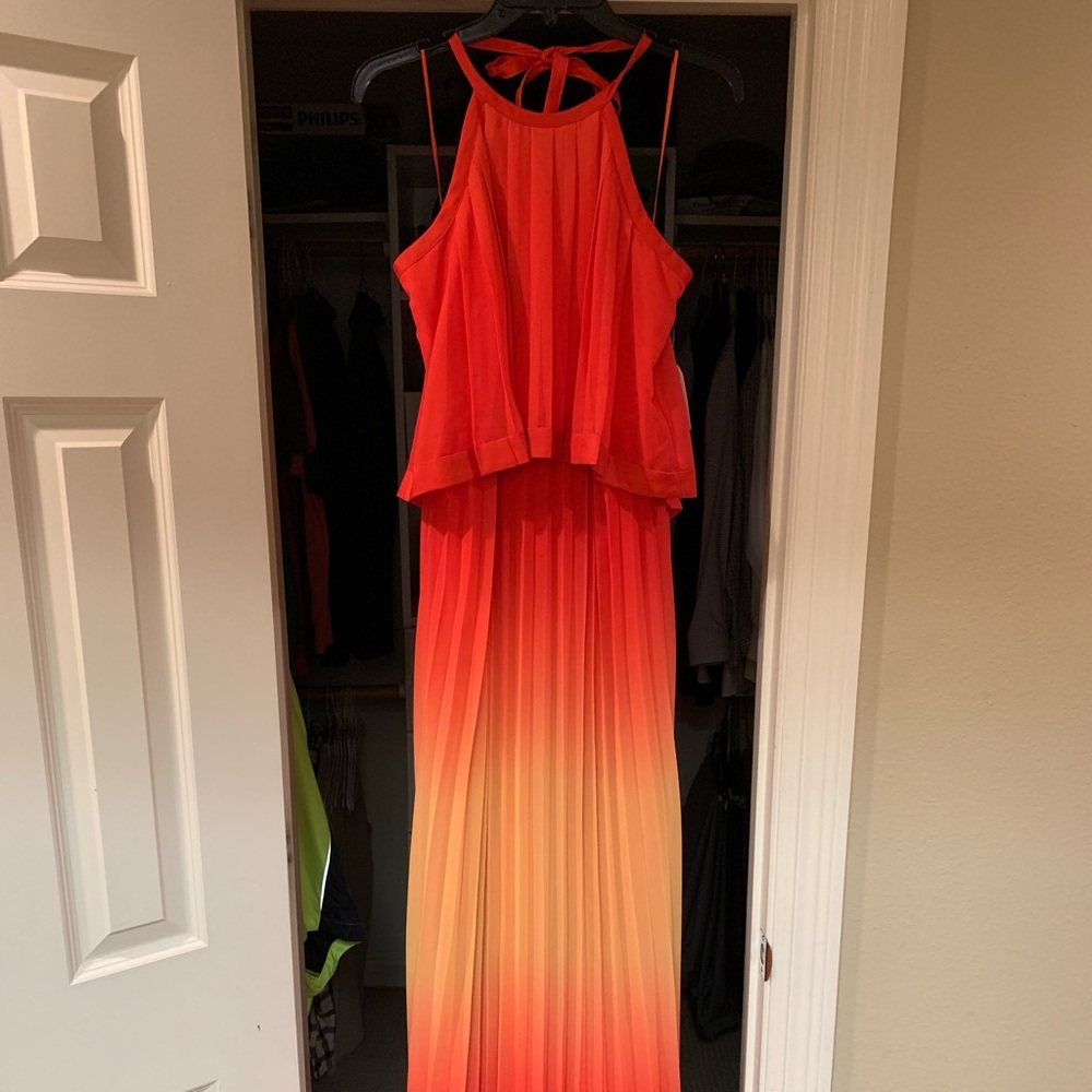 Orange and yellow accordion halter dress